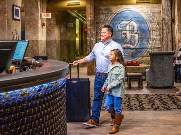 054 Family Checking in at Brewhouse Inn and Suites