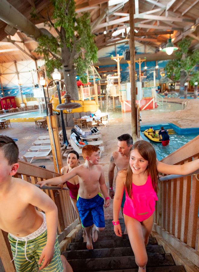Family walking up stairs at Springs Waterpark in Pewaukee, Wisconsin