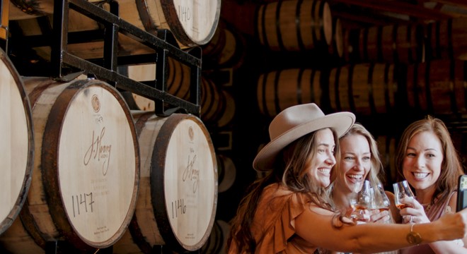 three women at famers market in madison