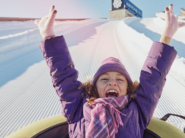 Snow Tubing-005 Close Up Of Girl Tubing