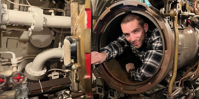 man in torpedo hole in USS Cobia